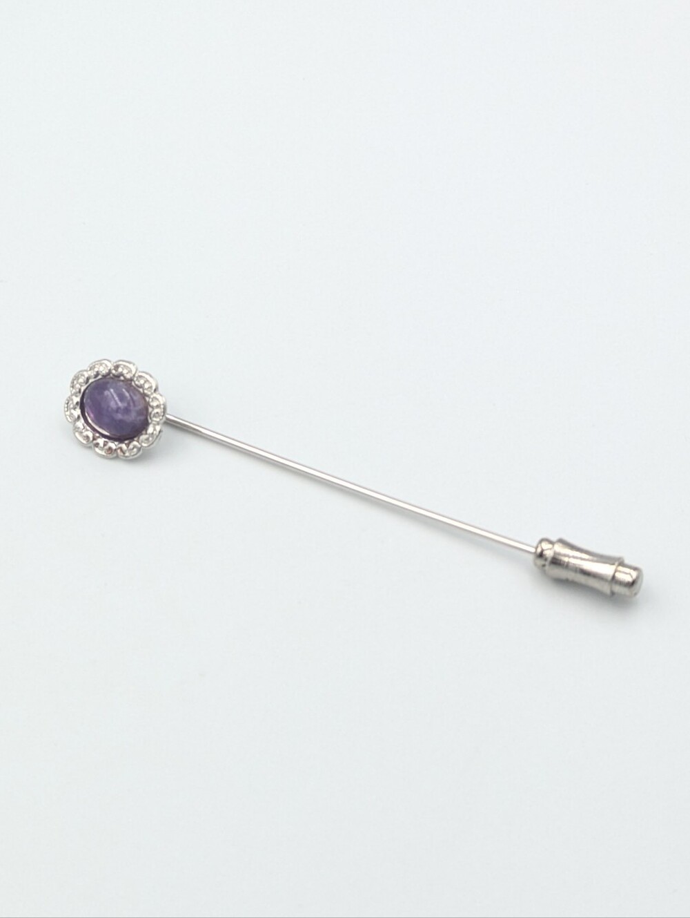 Vintage silver tone stick pin with purple amethyst cabochon